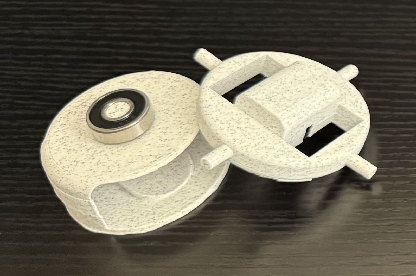 The hand-turned disc with its spoke and magnet insert