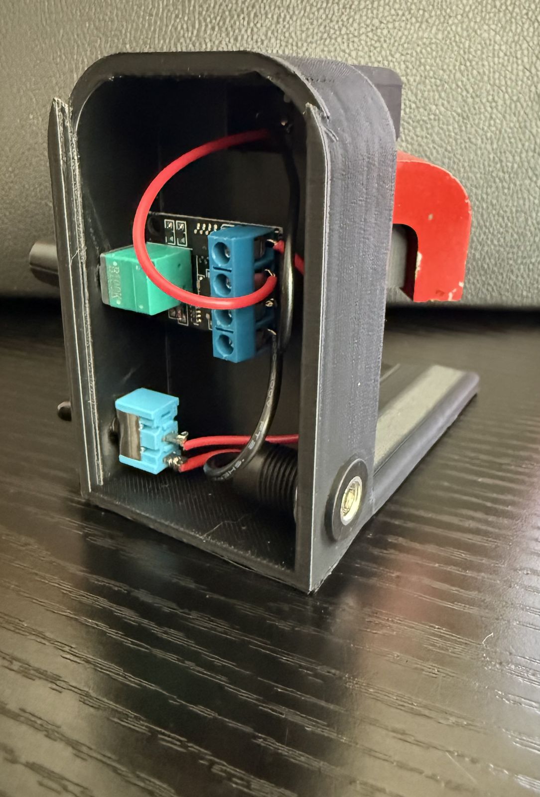Housing open, with the wiring inside